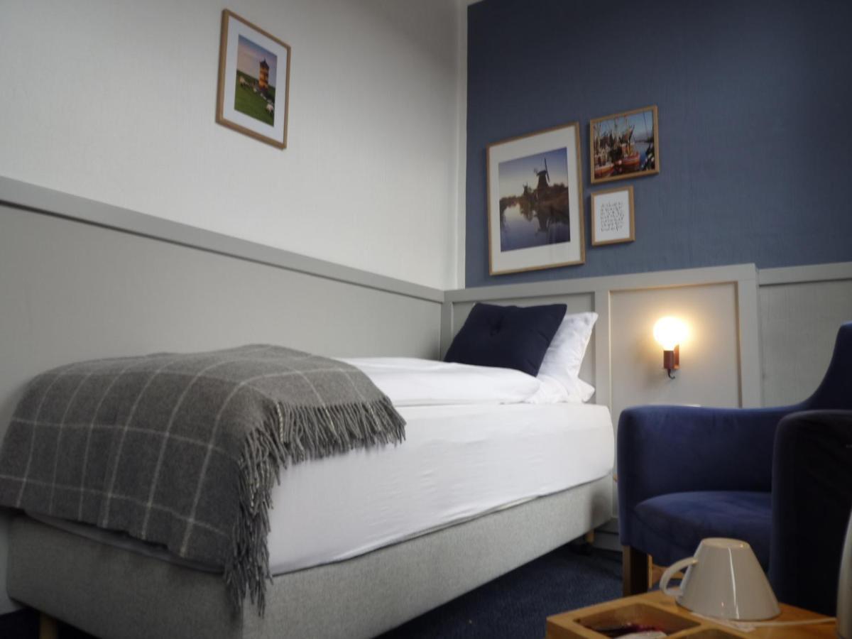 Hohes Haus Hotel Greetsiel Bagian luar foto